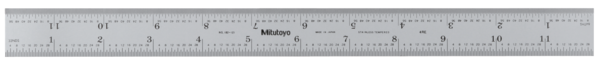 A 12 inch wide rigid steel rule with clear chrome finish and visible graduations.