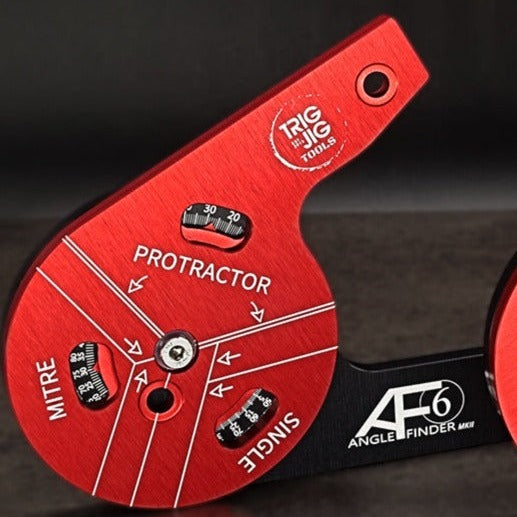 A red and black TrigJig AF6 Stubby Angle Finder Set with laser engraved scales and protractor display.