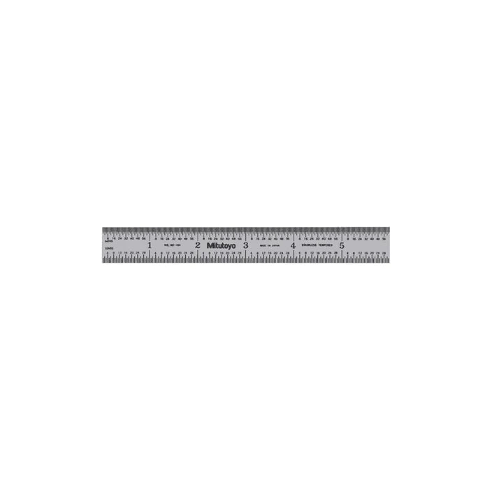 A 6-inch wide rigid steel ruler with clear graduations on a satin-chrome finish, marked with both metric and imperial measurements.